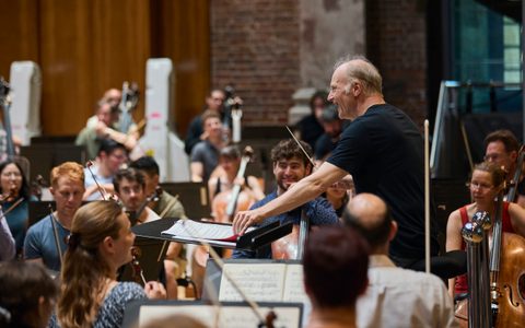 Conductor Gianandrea Noseda conducting the Orchestra and the Guildhall School of Music and Drama Orchestral Artistry students during a rehearsal at Jerwood Hall.