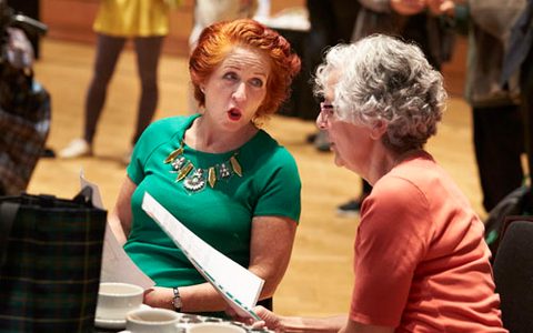 two women talking with each other