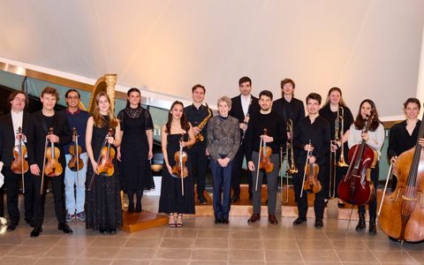 Group photo of the LSO Conservatoire Scholars with mentors and the Managing Director of the LSO.