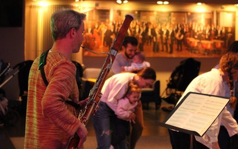 Musician playing bassoon for under-5s