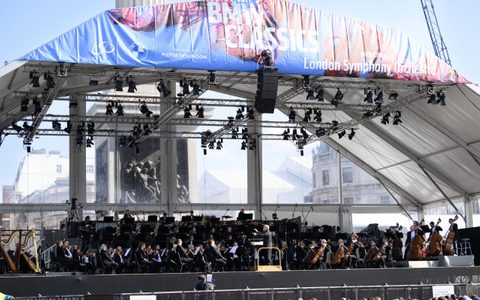 Sir Antonio Pappano conducting the LSO facing to the left of the orchestra at BMW Classics 2025 in Trafalgar Square, London